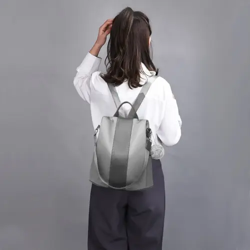 LG1903 - Miss Lulu Two Way Backpack Shoulder Bag with Pom Pom Pendant - Grey by All Mart Bristol Ltd