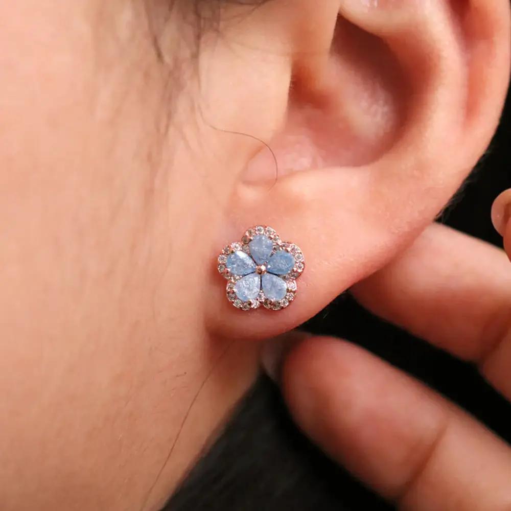 Flower earrings by Nabi London