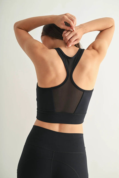 Strength meets style in the AirFlex Mesh Racerback Sports Bra by Me & I