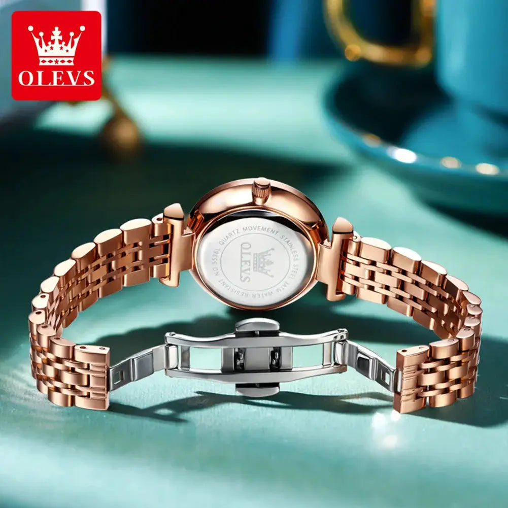 OLEVS brand beautiful women's watches Prism mirror waterproof fashion quartz watch for rose genuine date ladies wristwatch by All Mart Bristol Ltd
