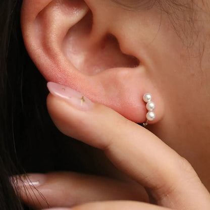 Triple Pearls Huggie Earring by Nabi London