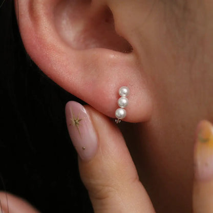 Triple Pearls Huggie Earring by Nabi London