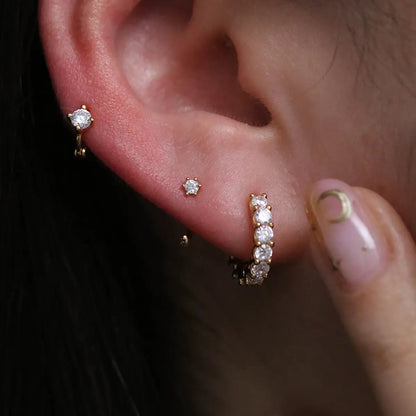 Simple Cubic Open Huggie Earring by Nabi London