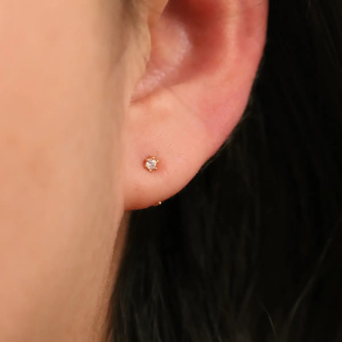 Simple Cubic Open Huggie Earring by Nabi London