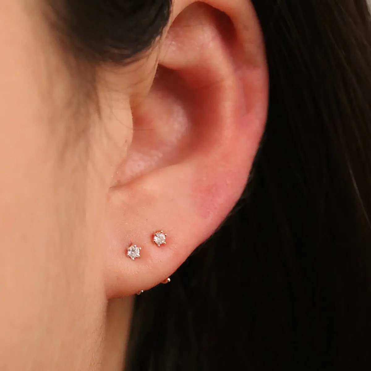 Simple Cubic Open Huggie Earring by Nabi London