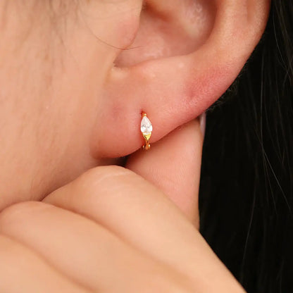 Teardrop Cubic Huggie Earring by Nabi London