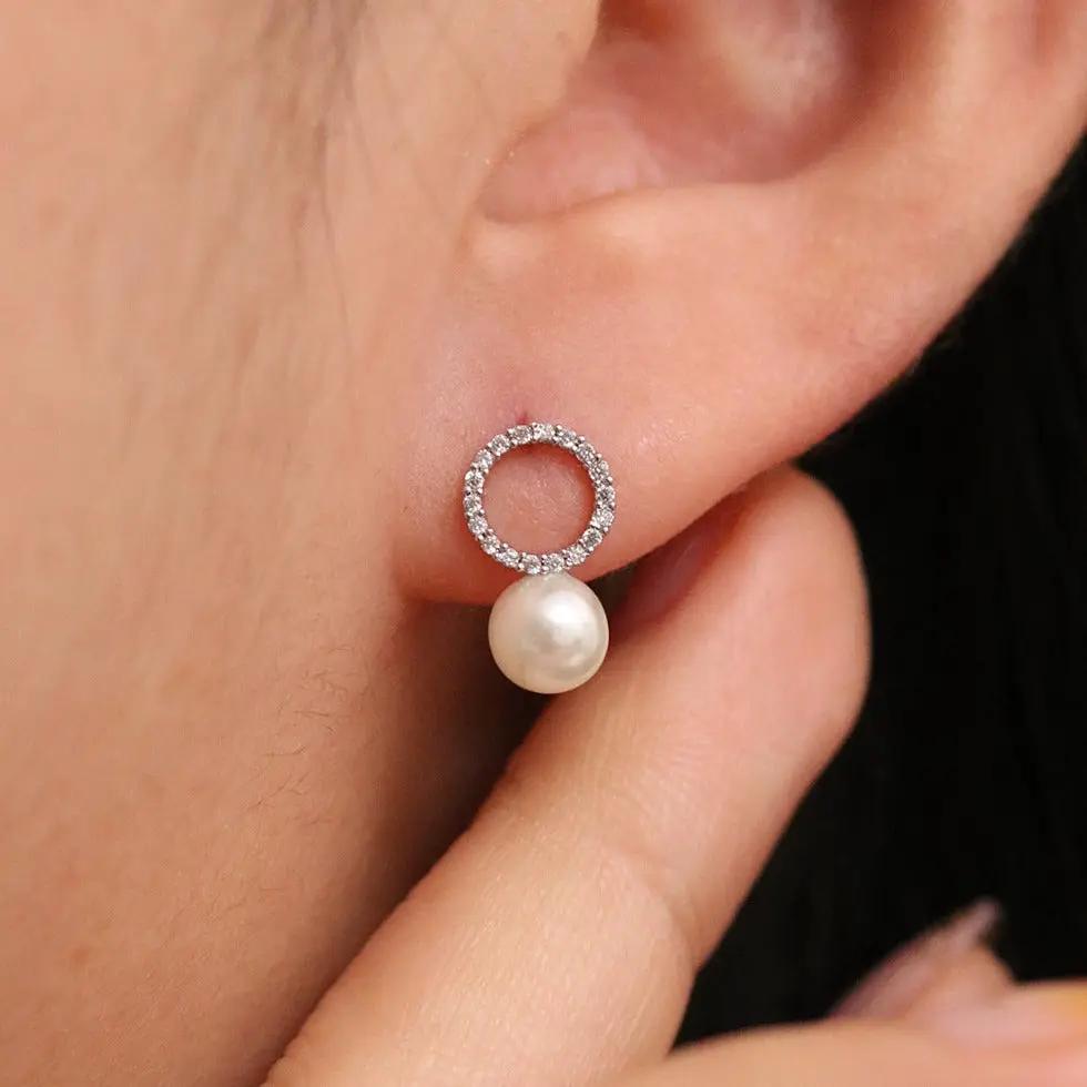 Circle pearl drop earrings by Nabi London