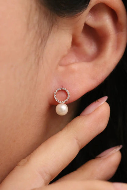 Circle pearl drop earrings by Nabi London