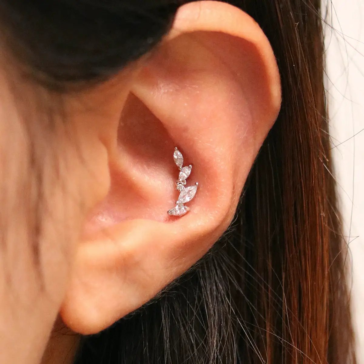 Stacked crystal piercing by Nabi London