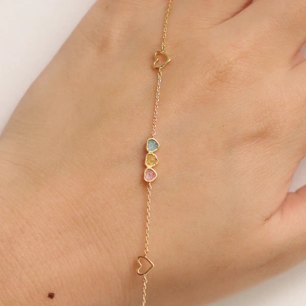 Triple heart bracelet by Nabi London