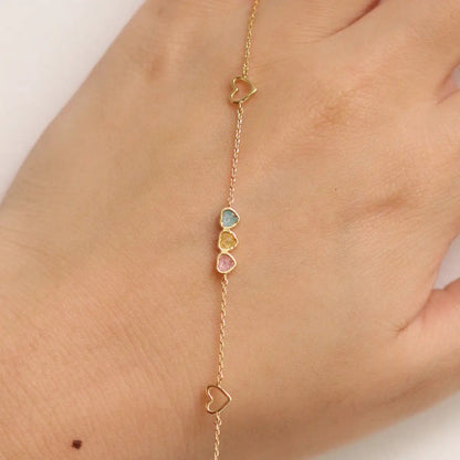Triple heart bracelet by Nabi London