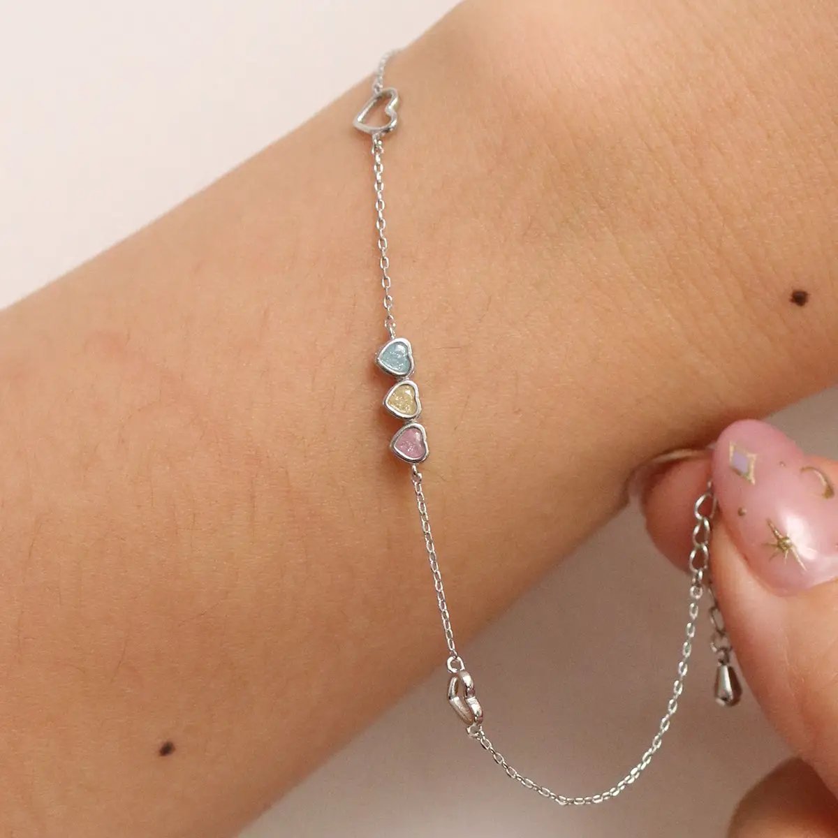 Triple heart bracelet by Nabi London