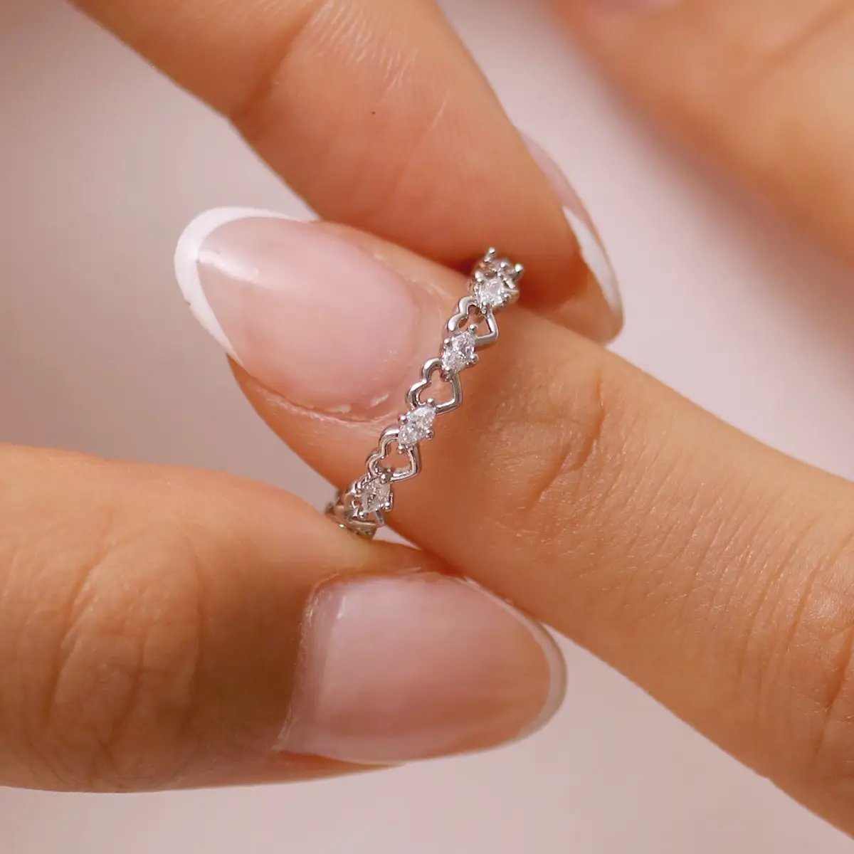 Cubic relay heart ring by Nabi London