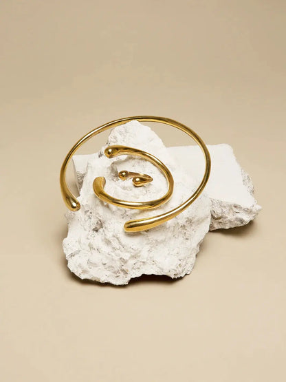 Jelani Twisted Recycled Brass Bangle by Paguro Upcycle