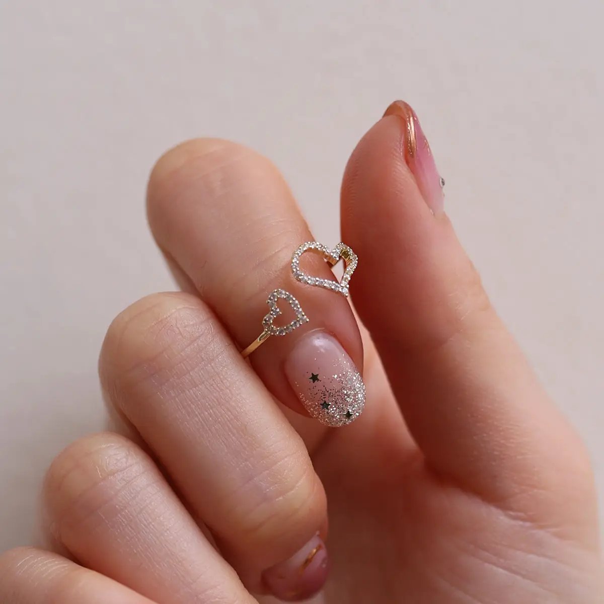 Double hearts ring by Nabi London