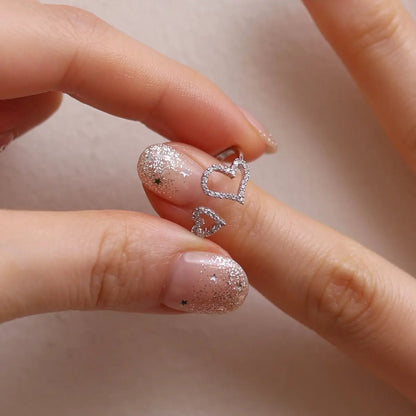 Double hearts ring by Nabi London