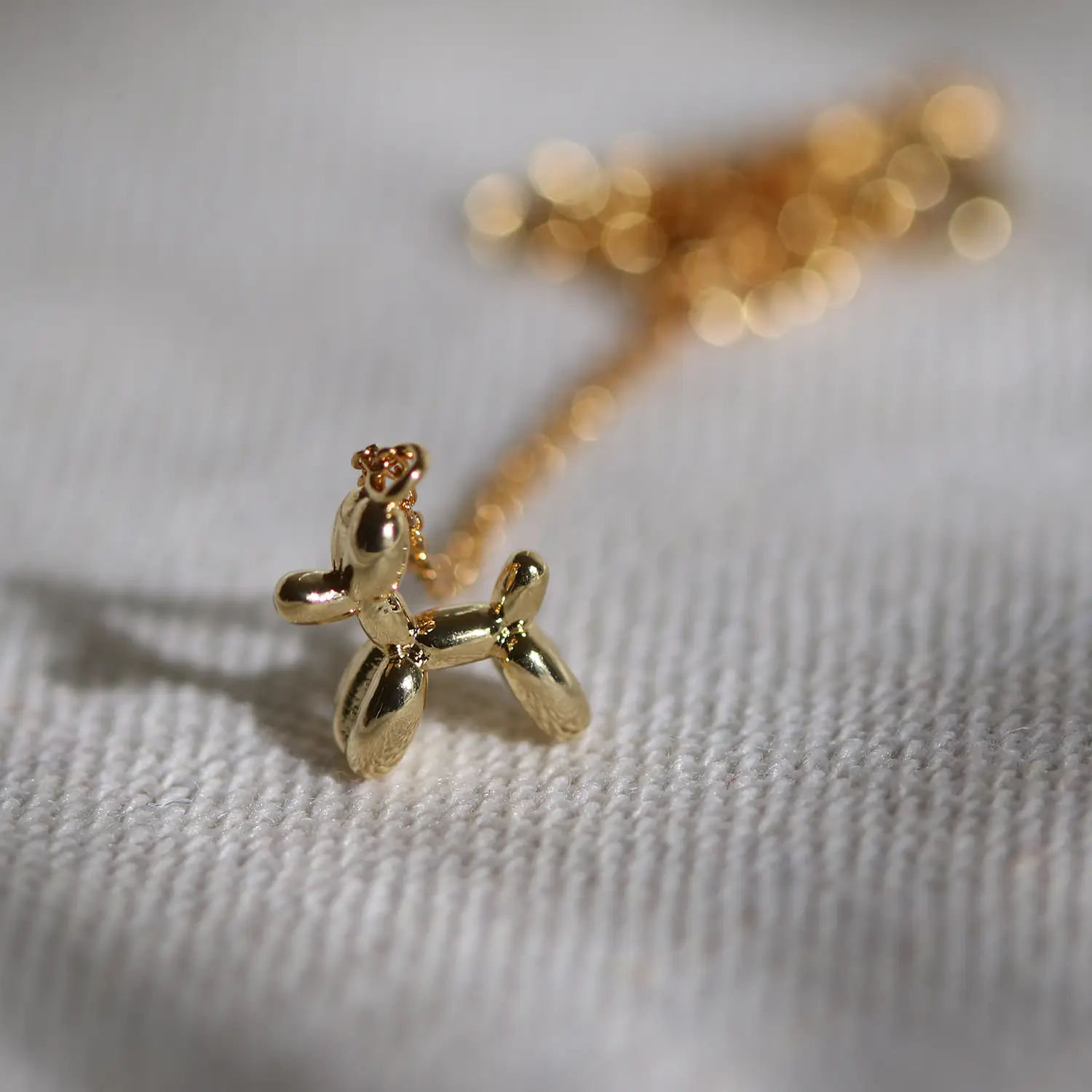 Balloon dog necklace by Nabi London