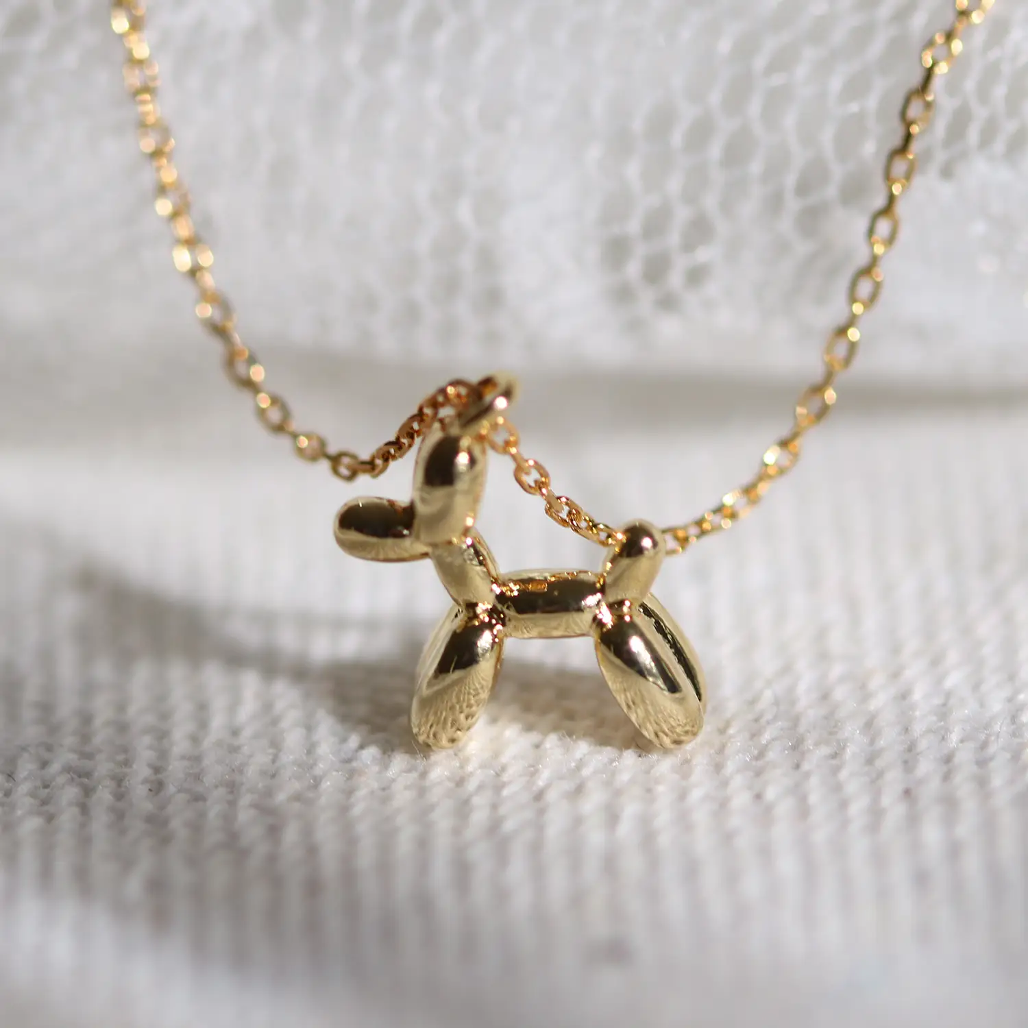Balloon dog necklace by Nabi London