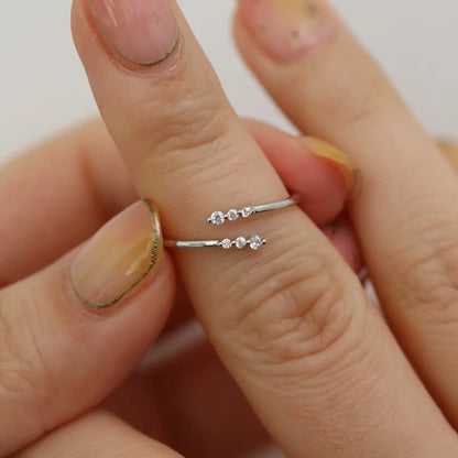 Triple cubic across ring by Nabi London