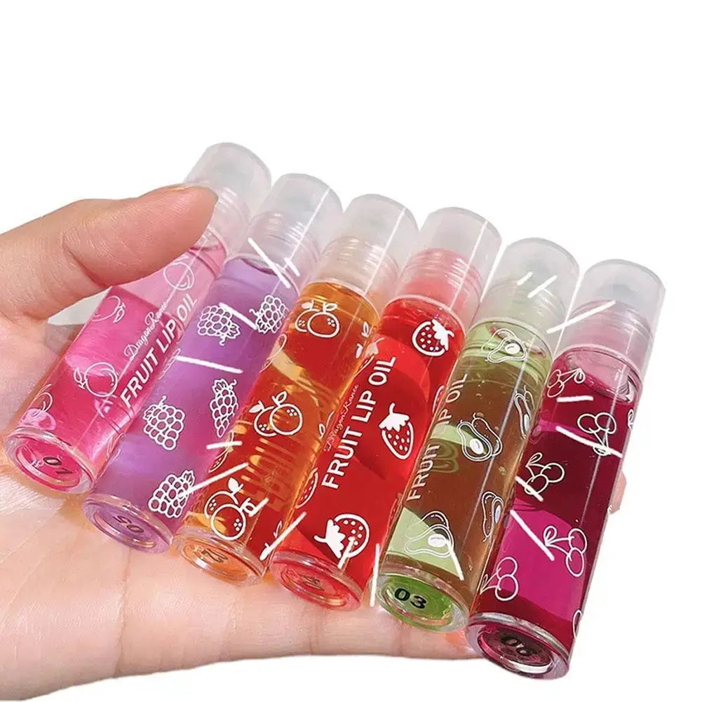 6 Colors Roll-on Fruit Essence Lip Balm Lip Oil Lip Moisturizing Mirror Primer Lip Lipstick Hydrating random Gloss Transparent by All Mart Bristol Ltd