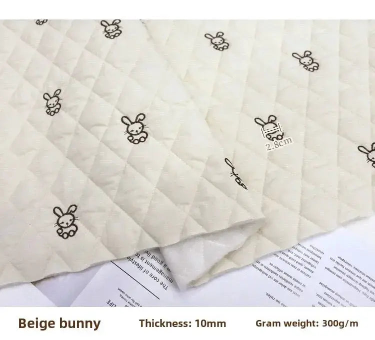 Cartoon Fabric Rhombus Bow Embroidery Padded Thermal Fabric Lined Children's Clothing Fabrics Soft by All Mart Bristol Ltd