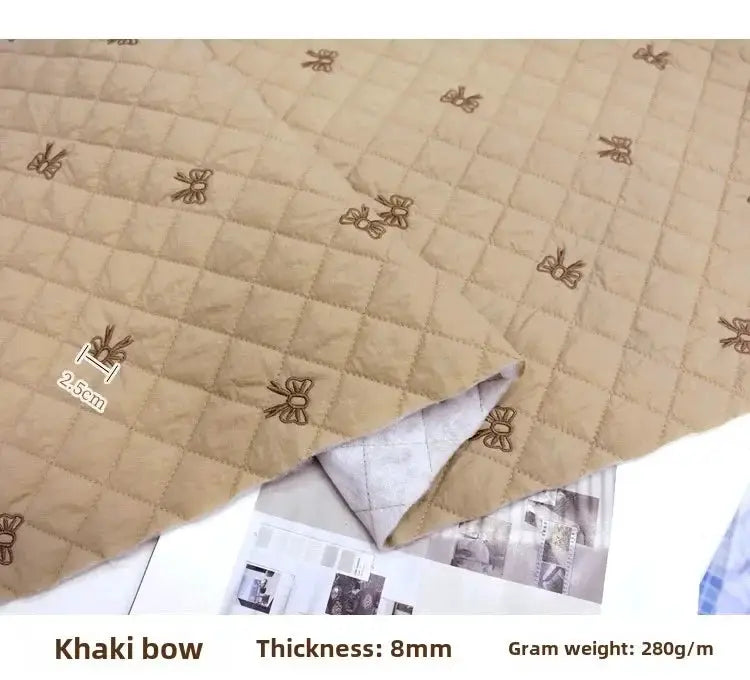 Cartoon Fabric Rhombus Bow Embroidery Padded Thermal Fabric Lined Children's Clothing Fabrics Soft by All Mart Bristol Ltd