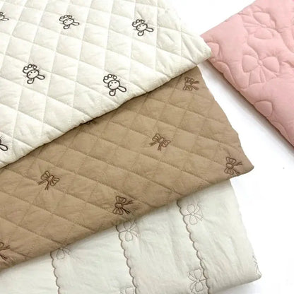 Cartoon Fabric Rhombus Bow Embroidery Padded Thermal Fabric Lined Children's Clothing Fabrics Soft by All Mart Bristol Ltd