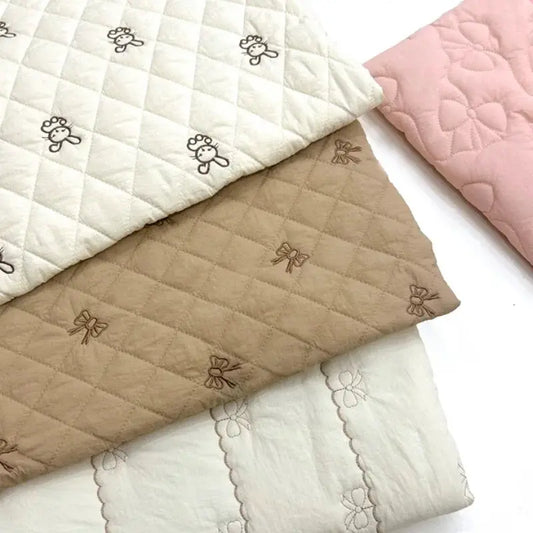 Cartoon Fabric Rhombus Bow Embroidery Padded Thermal Fabric Lined Children's Clothing Fabrics Soft by All Mart Bristol Ltd