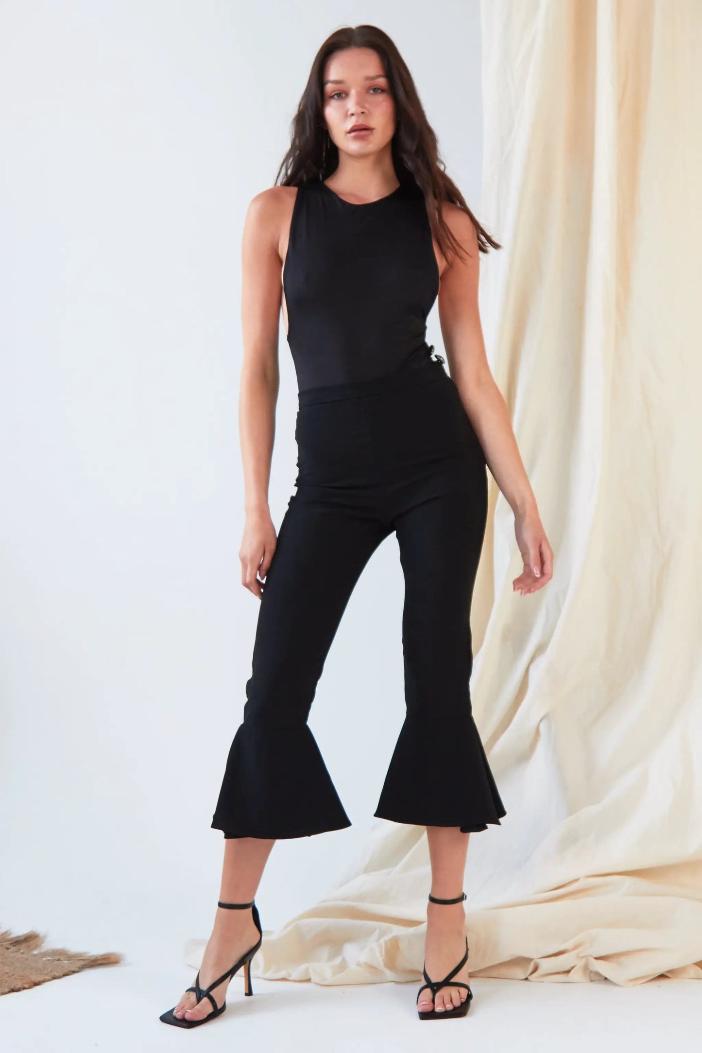 Black Frill Hem Trousers by Sarvin