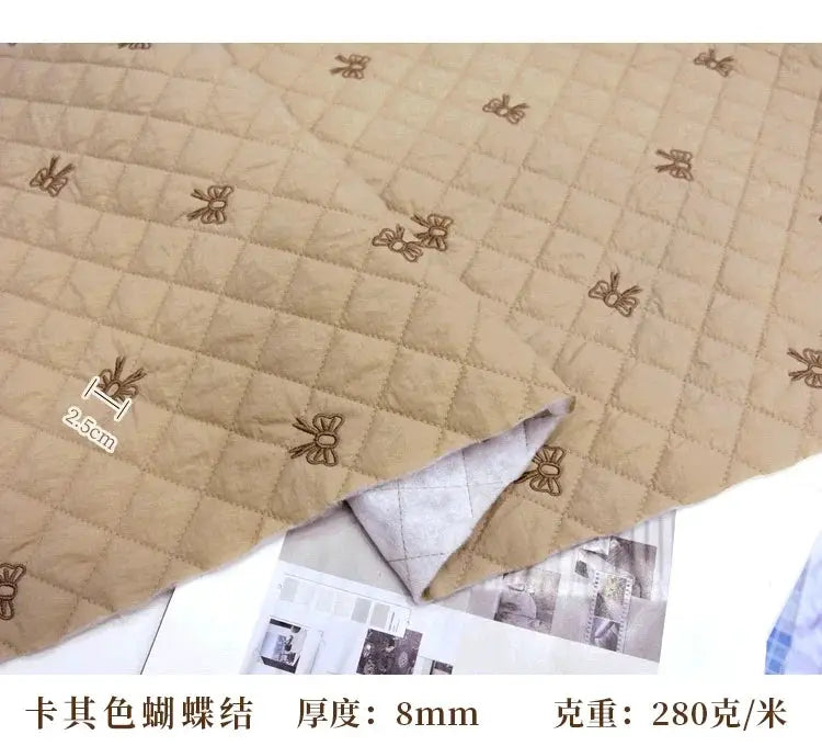 Cartoon Fabric Rhombus Bow Embroidery Padded Thermal Fabric Lined Children's Clothing Fabrics Soft by All Mart Bristol Ltd