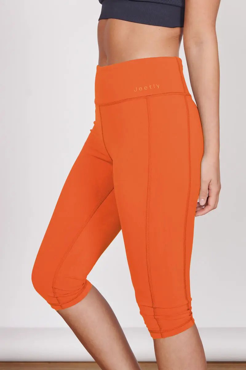 Taylor Orange 3/4 Sports Leggings by Jeetly.com