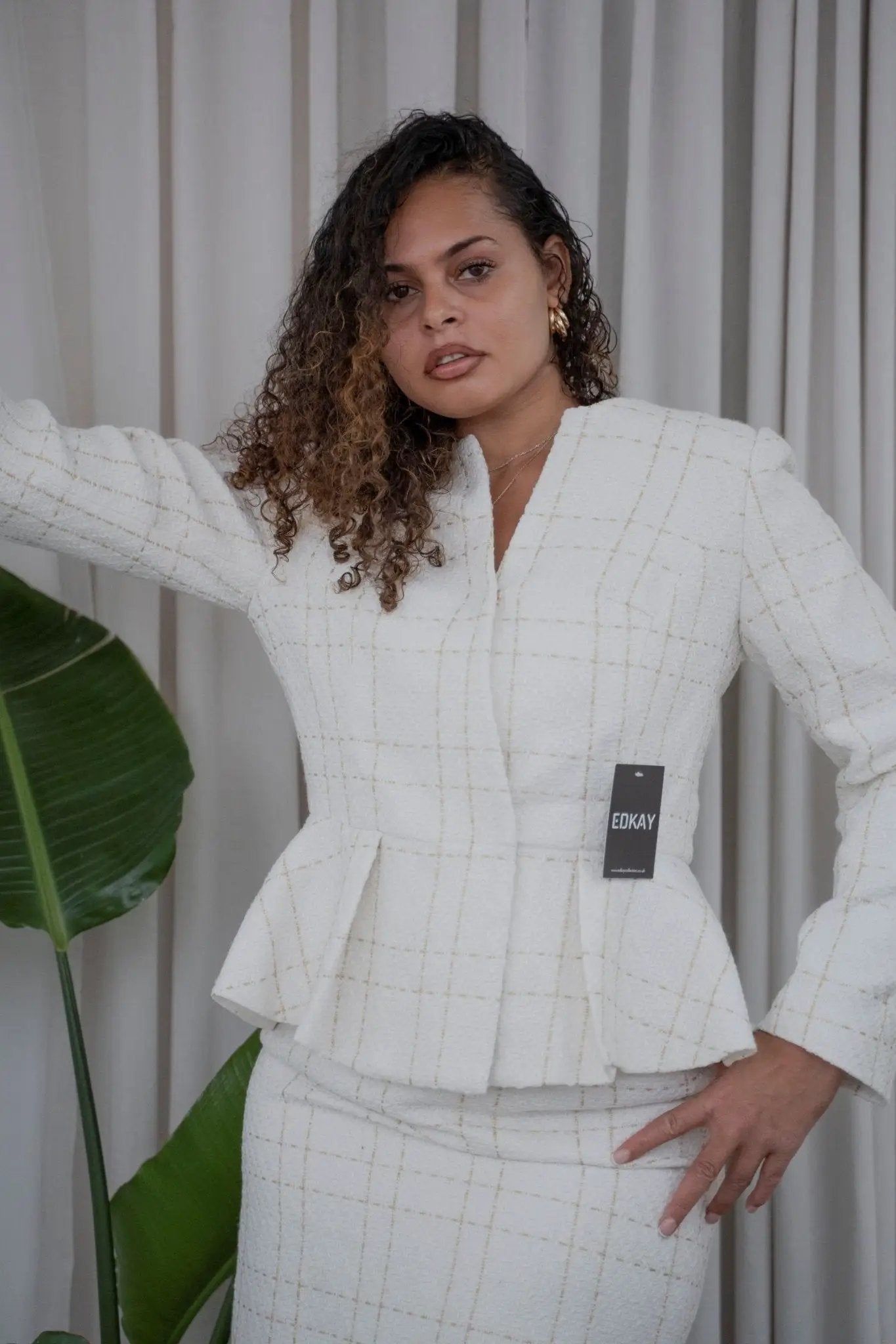 The pleated-peplum plaid tweed skirt suit (UK size 14) by EDKAY COLLECTION UK