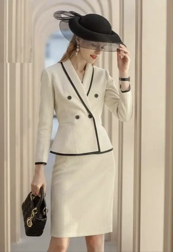The beige piped peplum tweed skirt suit by EDKAY COLLECTION UK